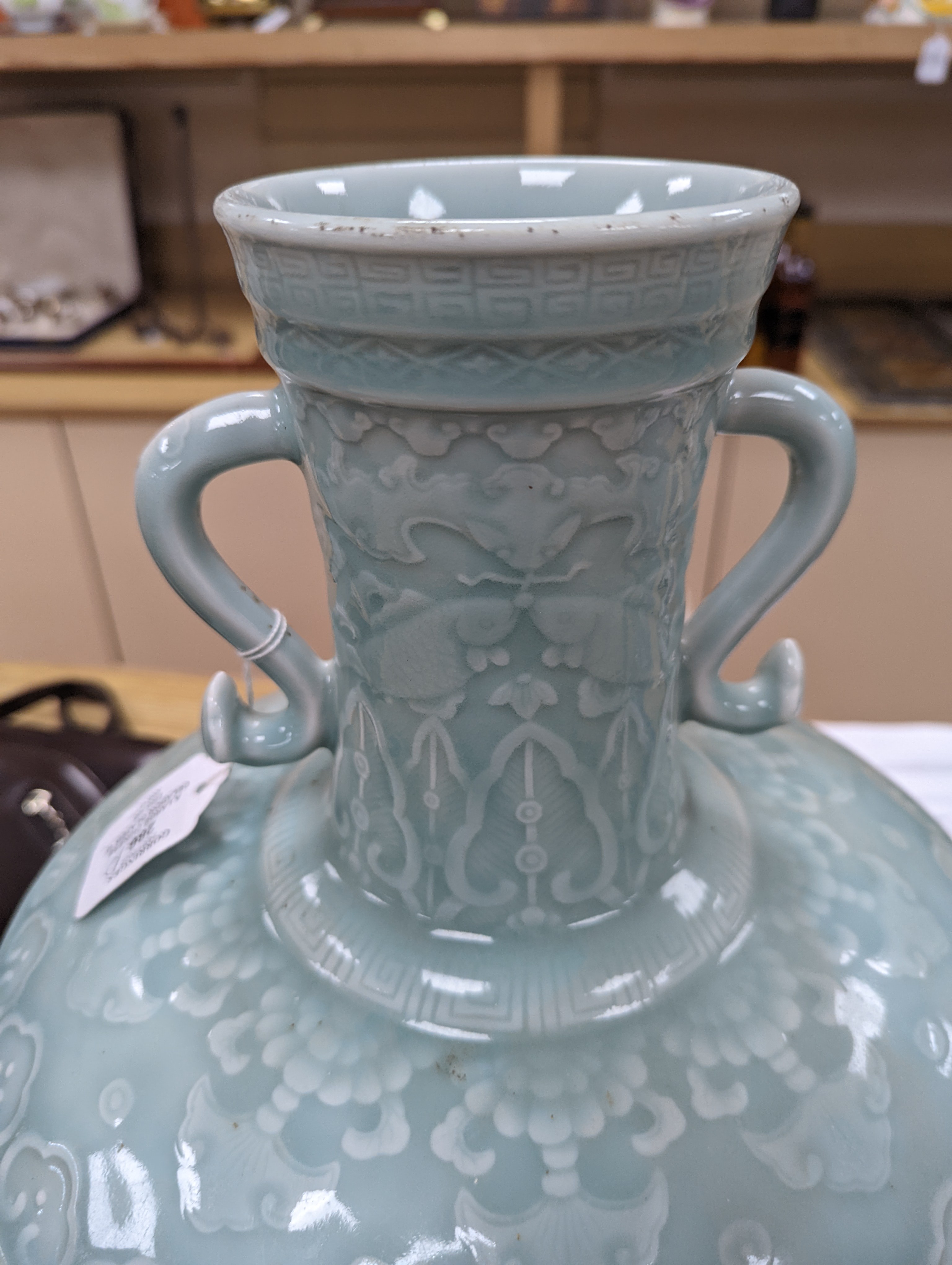 A large Chinese celadon glazed ‘Hundred Shou’ vase 41cm